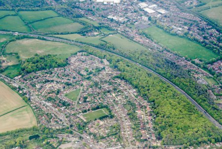 Photo for Aerial view of the Flackwell Heath district of High Wycombe in Buckinghamshire on a Spring afternoon.  The area has many sport facilities including a football club, tennis club and netball centre. - Royalty Free Image