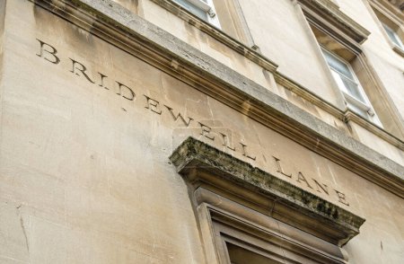 Photo for Incised lettering for the historic Bridewell Lane in the city of Bath, Somerset. - Royalty Free Image