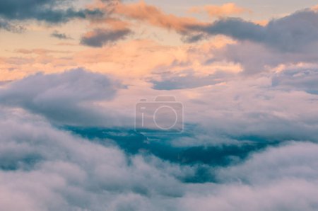 Photo for Fog and clouds on the valley at sunset - Royalty Free Image