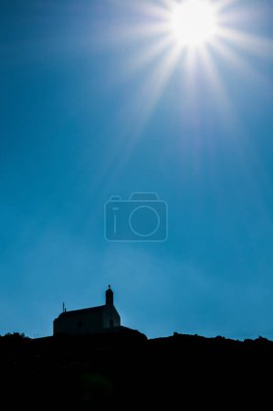 Photo for Church on the hill in backlight - Royalty Free Image