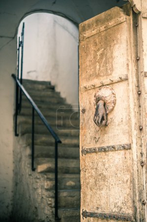 Photo for Ancient door  of an abandoned medieval palace details - Royalty Free Image