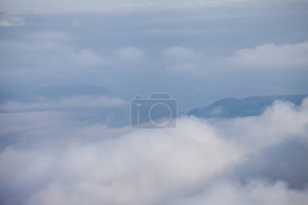 Photo for Cloudy sky and bad weather with mist overhead view - Royalty Free Image
