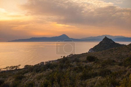 Photo for The saturated colors of the sunset over the island - Royalty Free Image