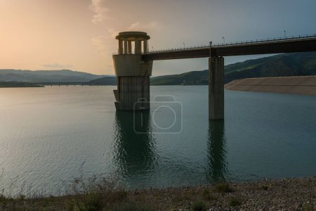Photo for The tower of the dam at sunset - Royalty Free Image
