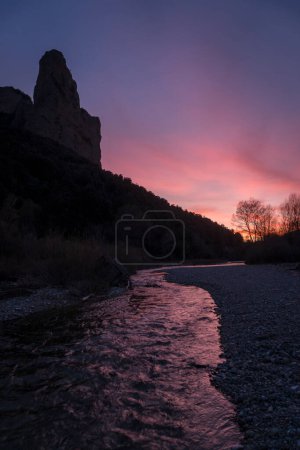 Photo for Mountain peaks at purple sunset - Royalty Free Image