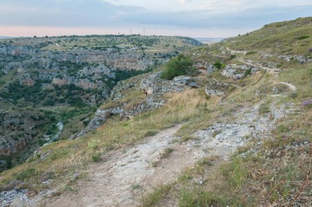 Photo for Afternoon view of murgia of Matera from the caves - Royalty Free Image