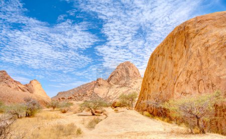 Photo for Beautiful view of Spitzkoppe bald granite peaks located between Usakos and Swakopmund in the Namib desert of Namibia - Royalty Free Image