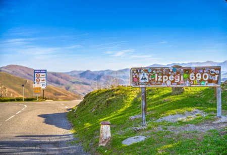 Photo for Road signs at Izpegi Pass between Pyrenean mountains - Royalty Free Image