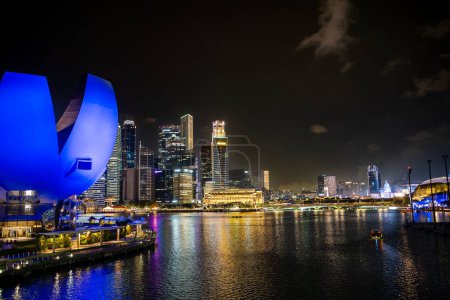 Photo for Singapore, Singapore - July 7th, 2023: Beautiful view of the city landmarks in the night time. - Royalty Free Image