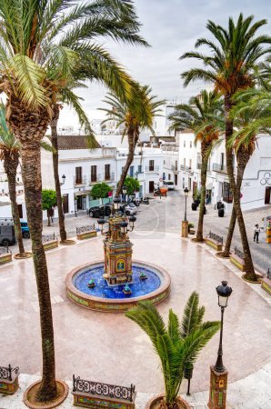 Photo for Vejer de la Frontera, Spain - 1 August 2023 : Beautiful view of Historical city center with ancient buildings in cloudy weather, HDR Image - Royalty Free Image