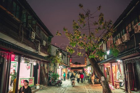 Photo for Suzhou, China - 1 December 2023: Scenic view of the city center by night-time - Royalty Free Image