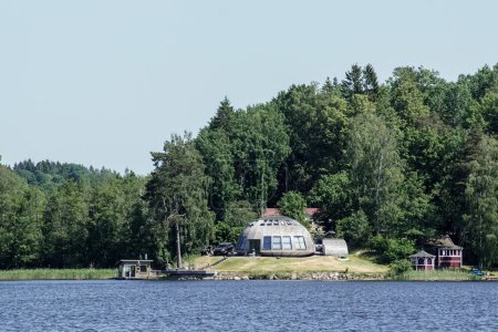 Photo for Building next to a lake during summer - Royalty Free Image