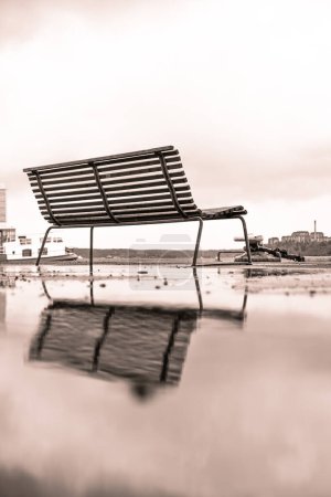 Photo for Low angle view of a bench against cloudy sky - Royalty Free Image