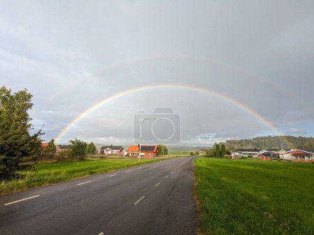 Photo for Scenic view of rainbow over road against sky - Royalty Free Image