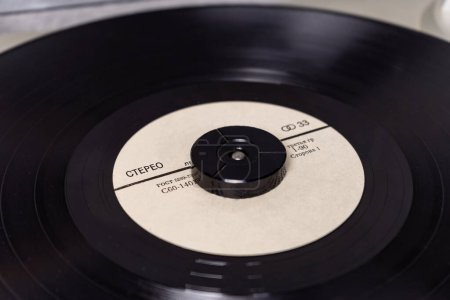 Closeup view on vintage vinyl record player, vinyl plate