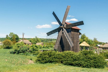 An old wooden windmill in the village of Pustovoitovka, Romensky district, Sumy region of Ukraine.