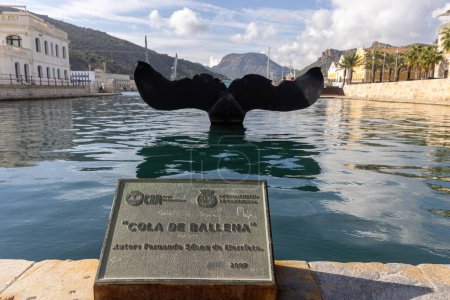 Photo for Plaque Cola de Ballena meaning Whale tail in Spanish. Sculpture in Cartagena port at Murcia Spain in Mediterranean - Royalty Free Image