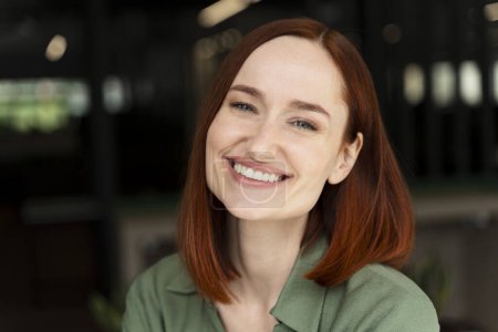 Photo for Close-up emotional professional portrait of successful determined middle aged ginger woman, female CEO, manager in sales department, smiling toothy smile looking at camera. People and career concept - Royalty Free Image