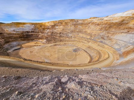 Photo for Panoramic view of an open pit mine on a sunny morning - Royalty Free Image
