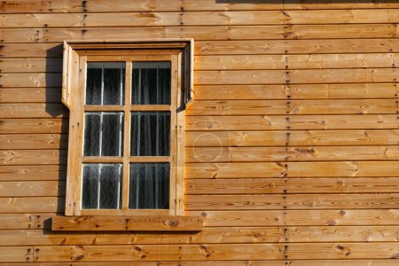 Photo for Wall of wooden house with window, blank space for writing - Royalty Free Image