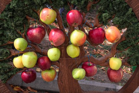 Photo for Decorative tree with natural apples. Decoration for the vegetable shop - Royalty Free Image