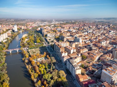 Aerial point of view of Valladolid city. View of River Pisuerga and Juan de Austria Bridge. At the right is the city center of Valladolid. Travel destination in Spain.  