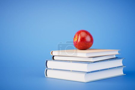 Books tower with apple isolated on blue background. 3d render.