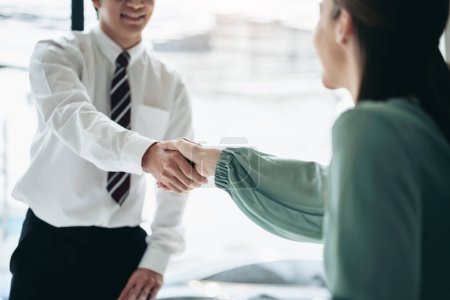 Photo for Business teamwork colleague concept, Business colleague shaking hands together after work successful about collaboration to brainstorming and discussing about strategy of new startup. - Royalty Free Image