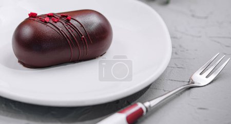 Photo for Chocolate cheesecake dessert on plate close up - Royalty Free Image