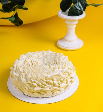 White Mousse Cake on Yellow Background