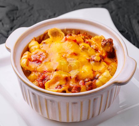 Photo for Macaroni and cheese baked on plate - Royalty Free Image