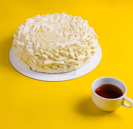 Coffee Mousse Cake with Coffee Cup on Yellow Background