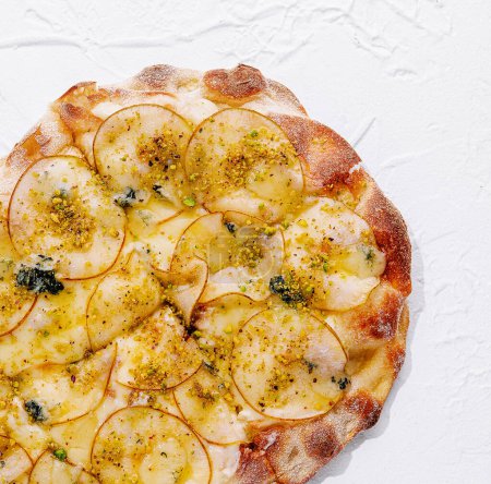 pizza with pear and cheese top view