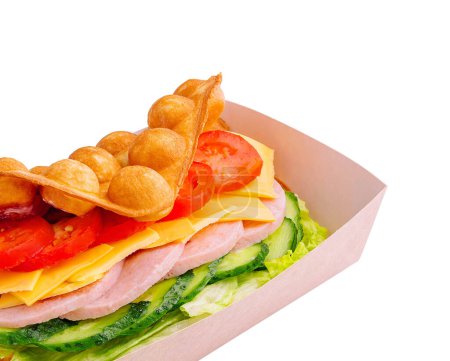 Belgian waffles with ham, cheese and salad on box