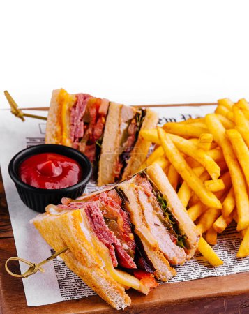 Mini sandwiches with ham and fries with sauces