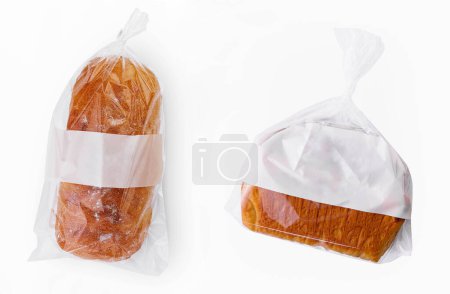 Loaf of wheat bread in plastic bags isolated