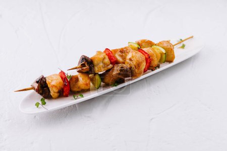 Delicious bbq chicken kebabs with mushrooms, peppers, and zucchini, perfect for a healthy meal