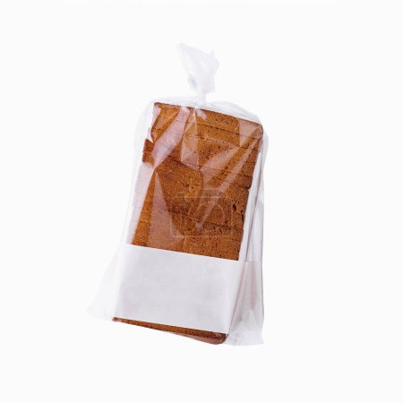 Clear plastic bag containing slices of fresh brown bread, isolated on a white background