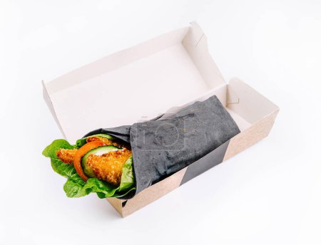 Healthy vegetable wrap in eco-friendly packaging, isolated on a white background for easy takeaway meal concepts