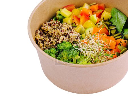 Bol écologique rempli de salade de quinoa colorée, parfait pour un repas sain