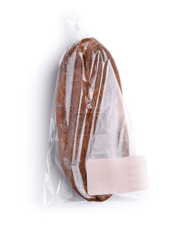 Sealed loaf of artisan panneaux bread in transparent packaging, isolated on a white backdrop