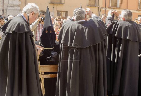 Photo for Holy Week in Zamora in Toro, Brotherhood of Jess Nazareno and animas, the Conqueros also called cagalentejas on Holy Thursday. Rite of silence for the penitents before going to beg with the bowls. - Royalty Free Image