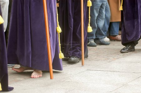 Photo for Holy Week in Zamora, Spain. Procession of the Brotherhood of Santa Vera Cruz on the afternoon of Holy Thursday. Bare foot of a penitent. - Royalty Free Image