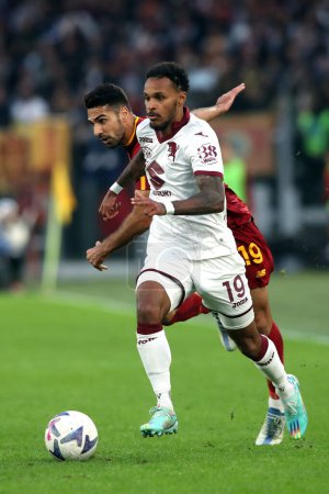 Photo for Rome, Italy 13.11.2022: Mehmet Celik (AS ROMA), Lazzaro Valentino of Torino in action during the Serie A match between AS Roma and FC Torino at Stadio Olimpico in Rome, Italy. - Royalty Free Image