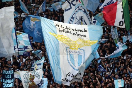 Photo for Rome, Italy 19.03.2023:  Lazio supporters on the stand  in  during the Serie A Championship, football match derby between SS Lazio vs AS Roma at Stadio Olimpico in Rome, Italy. - Royalty Free Image