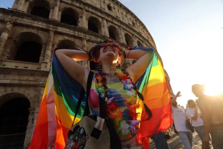 Photo for Rome, Italy 10.06.2023:  More than one hundred thousand people from all over Europe paraded at the 2023 Rome Gaypride through the streets of the capital Rome up to the Colosseum. - Royalty Free Image