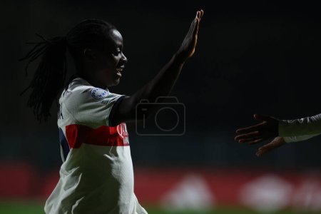 Photo for Rome, Italy 20.12.2023: Chawinga of PSG. score the goal and celebrate with the team  the UEFA WOMEN CHAMPIONS League 2023-2024 football match AS ROMA vs Paris Saint-Germain at tre fontane stadium in Rome. - Royalty Free Image