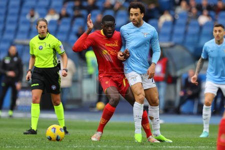 Photo for Rome, Italy 14.01.2024: Ceesay of Lecce, Felipe Anderson of Lazio  in action during  the Italian Serie A TIM 2023-2024 football match SS Lazio vs US Lecce at Olympic Stadium in Rome. - Royalty Free Image