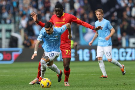 Photo for Rome, Italy 14.01.2024 : Mattia Zaccagni of Lazio , Ceesay of Lecce in action during  the Italian Serie A TIM 2023-2024 football match SS Lazio vs US Lecce at Olympic Stadium in Rome. - Royalty Free Image