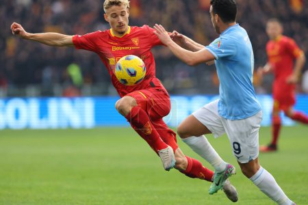 Photo for Rome, Italy 14.01.2024: Askildsen of Lecce, Pedro of Lazio  in action during  the Italian Serie A TIM 2023-2024 football match SS Lazio vs US Lecce at Olympic Stadium in Rome. - Royalty Free Image